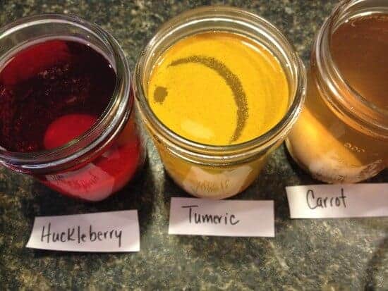 Egg dye in glass jars.