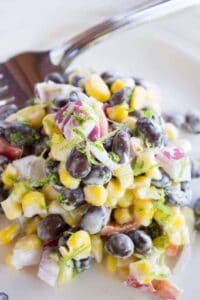Black bean and corn salad with a jalpeno lime dressing. beyondthechickencoop.com