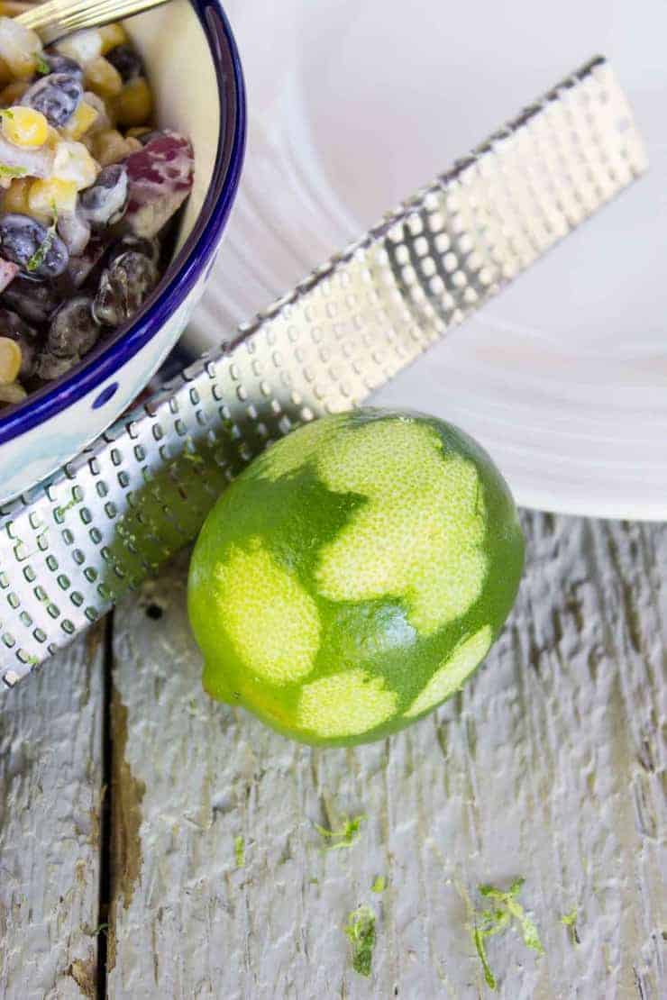 Fresh lime zest with a rasp grater.