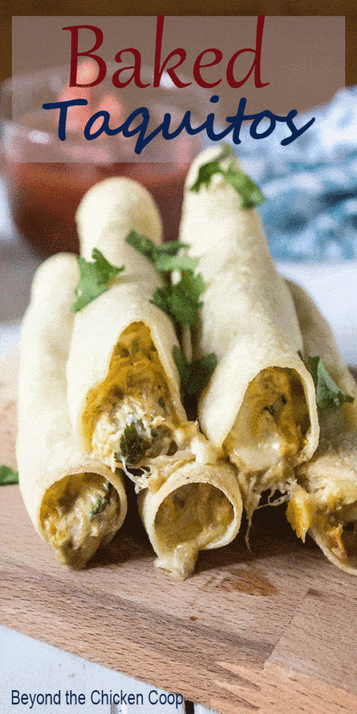 Baked chicken taquitos with a creamy chicken filling. These mini tacos are baked and are perfect for dinner or served as an appetizer. #taquitos #tacos