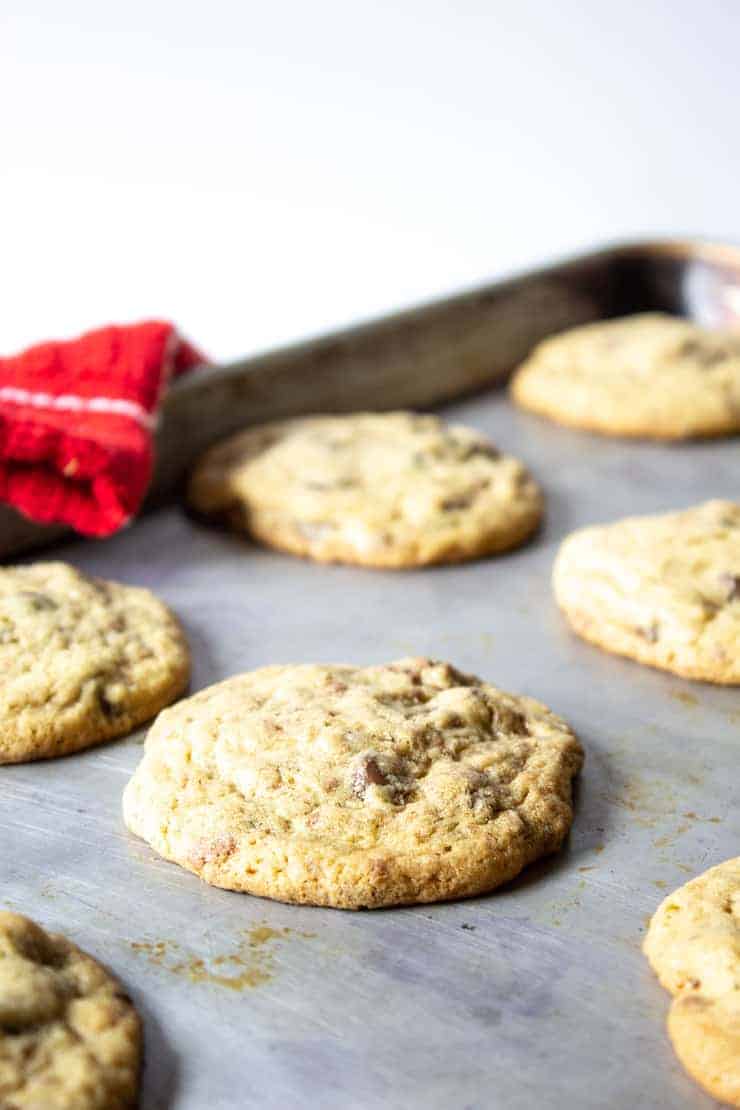 Toffee Chip cookies on a baking sheet