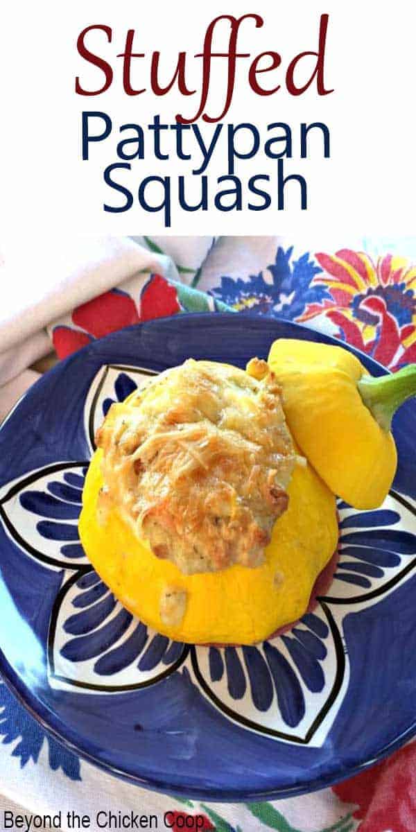 Pattypan squash filled with cheesy stuffing and a blue and white flowered plate.