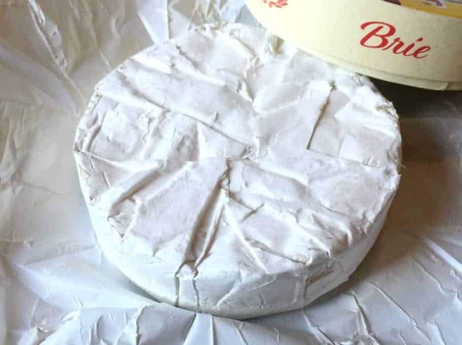 A round of brie cheese.