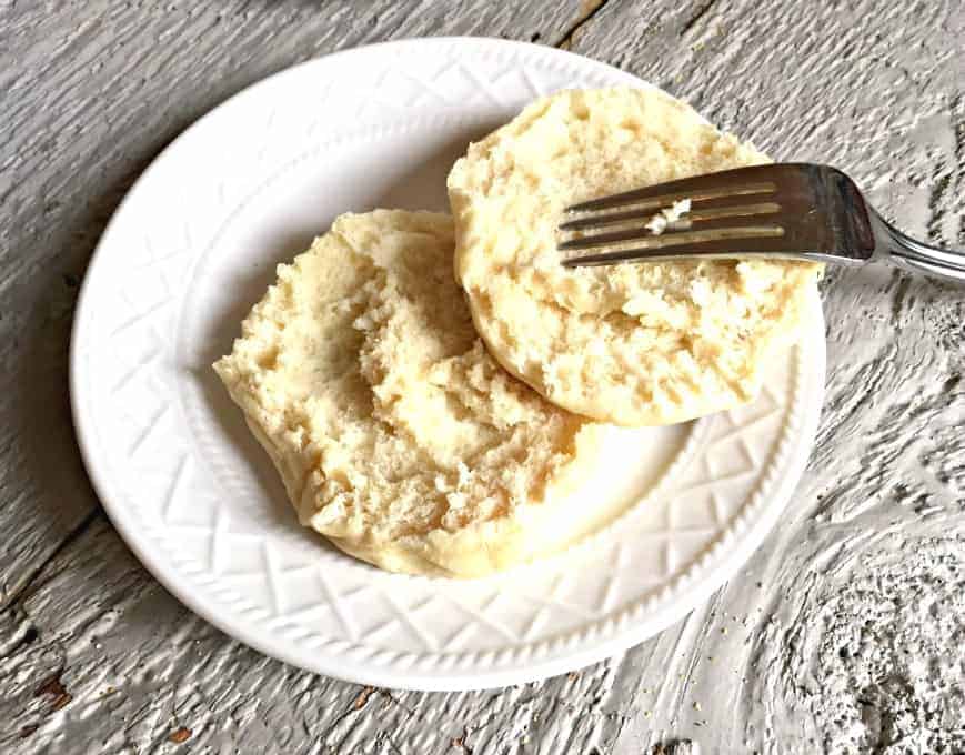 Fork Split English Muffin on a plate.