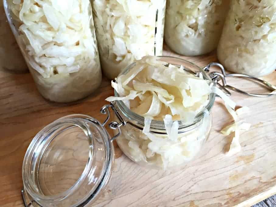 Homemade sauerkraut in glass jars. 