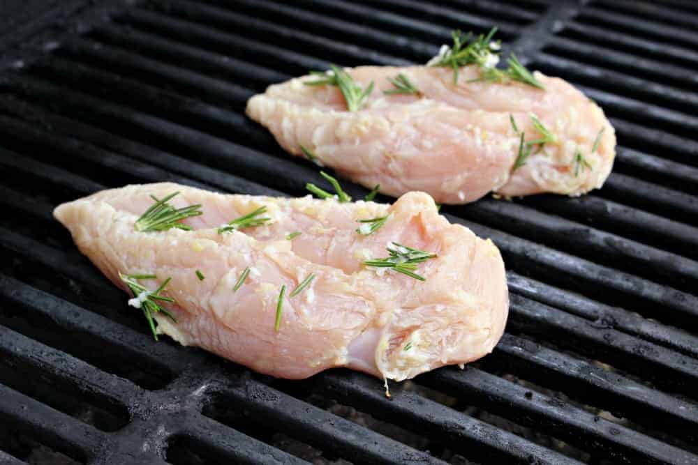 Lemon Rosemary Grilled Chicken on the grill.