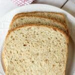 Slices of wheat bread arranged on a plate.