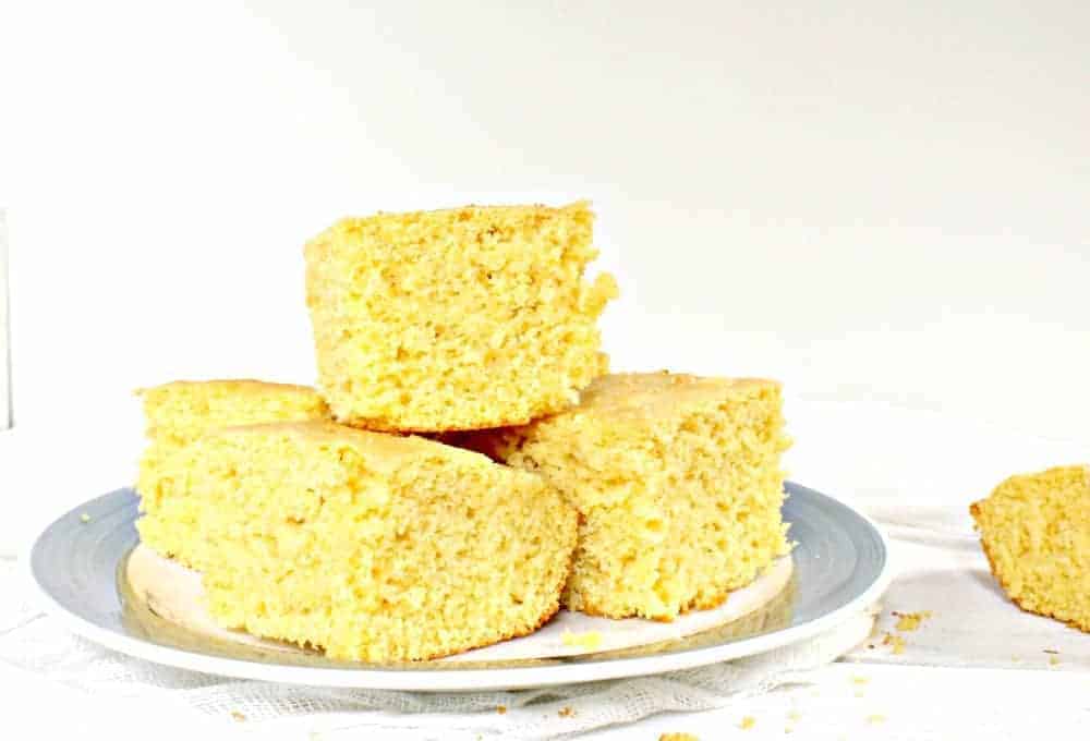 Cornbread on a blue and white plate.