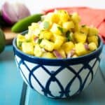 Pineapple Salsa in a blue and white bowl.