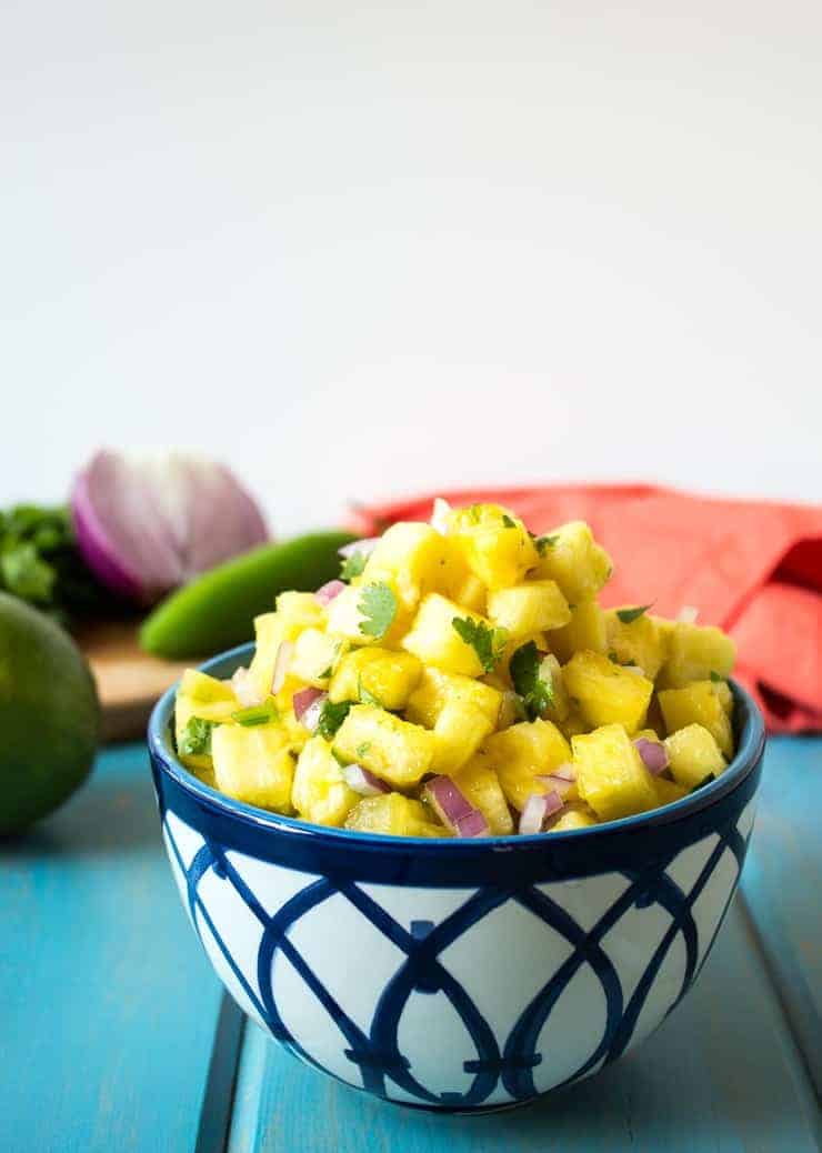 Fresh chopped pineapple with cilantro and onions.