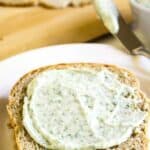 A slice of bread topped with basil mayonnaise.