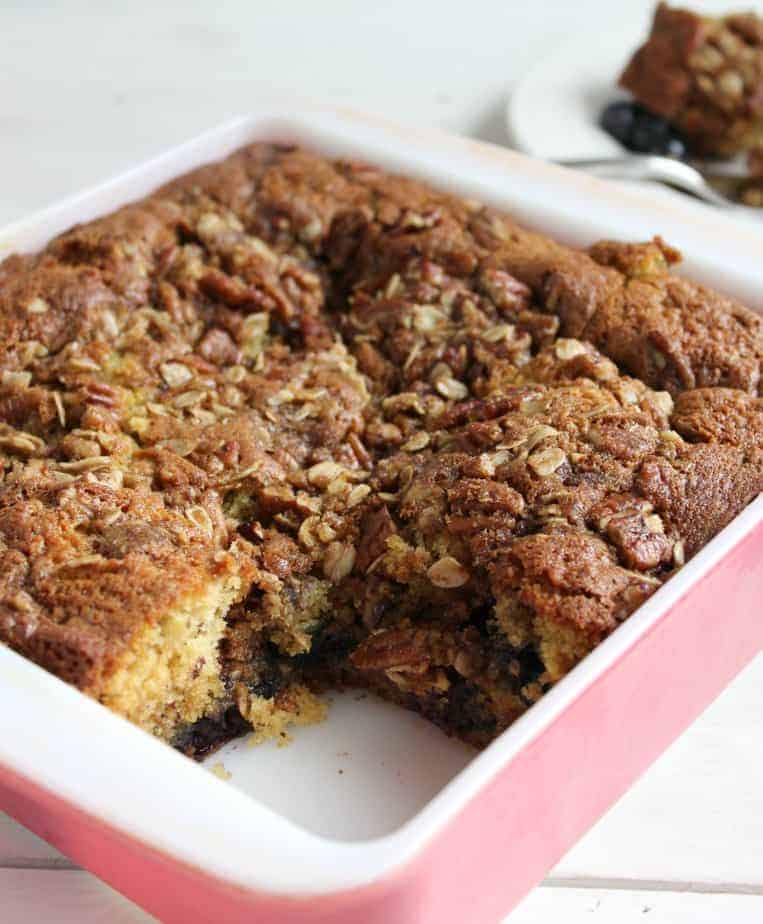 Blueberry Banana Coffee Cake with a Pecan Crumble Topping in a baking dish.