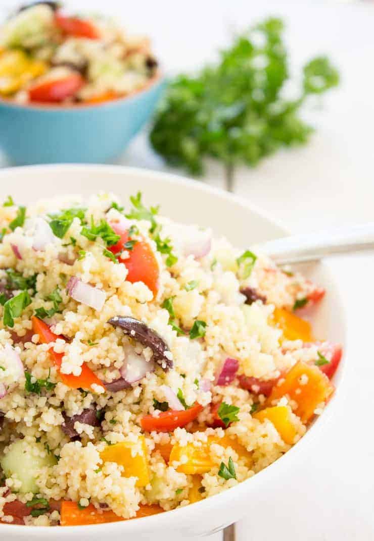 Mediterranean Couscous Salad with bell peppers, onions and olives.