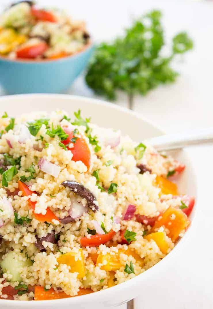 Fresh veggies, a light dressing, and couscous makes a perfect salad.