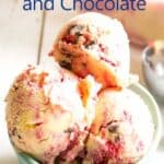 Scoops of vanilla ice cream with raspberry and chocolate.