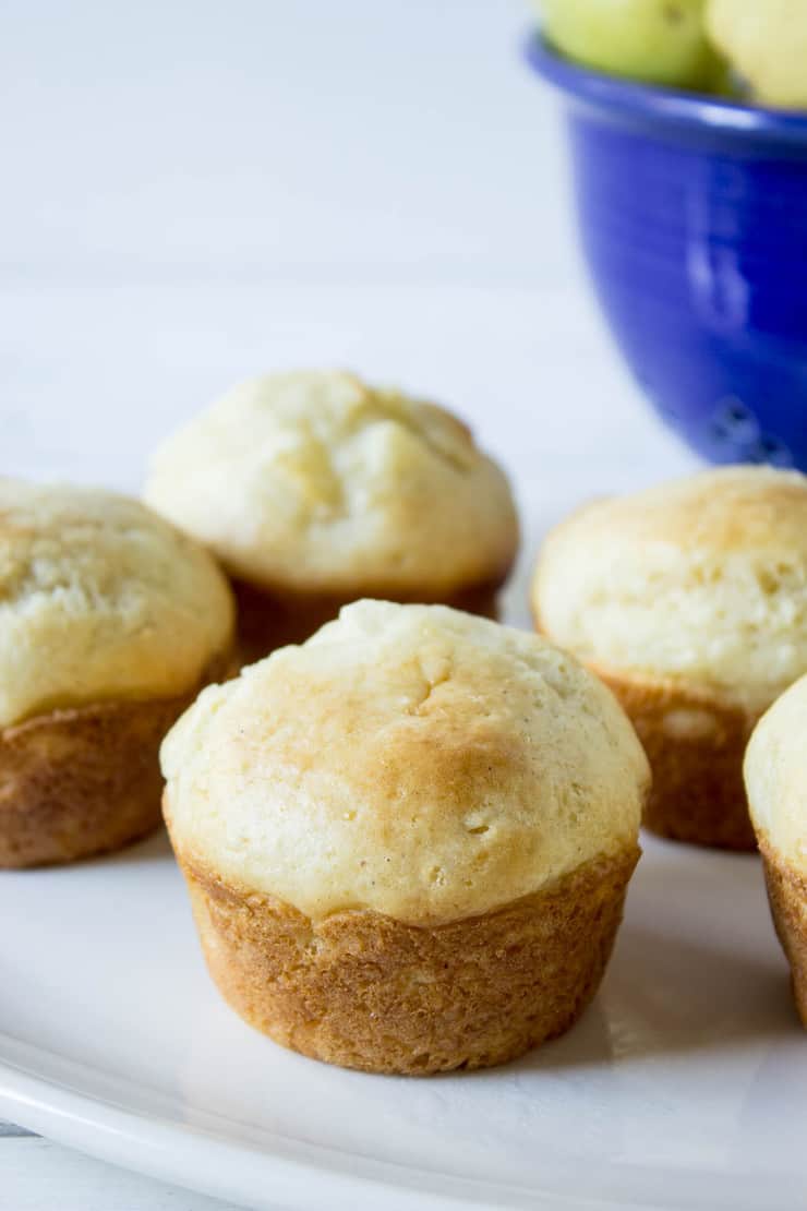 Pear muffins made with fresh pears served on a white plate