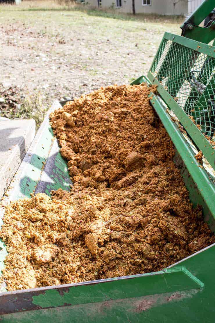 Pulp left from pressing apples in a tractor. 