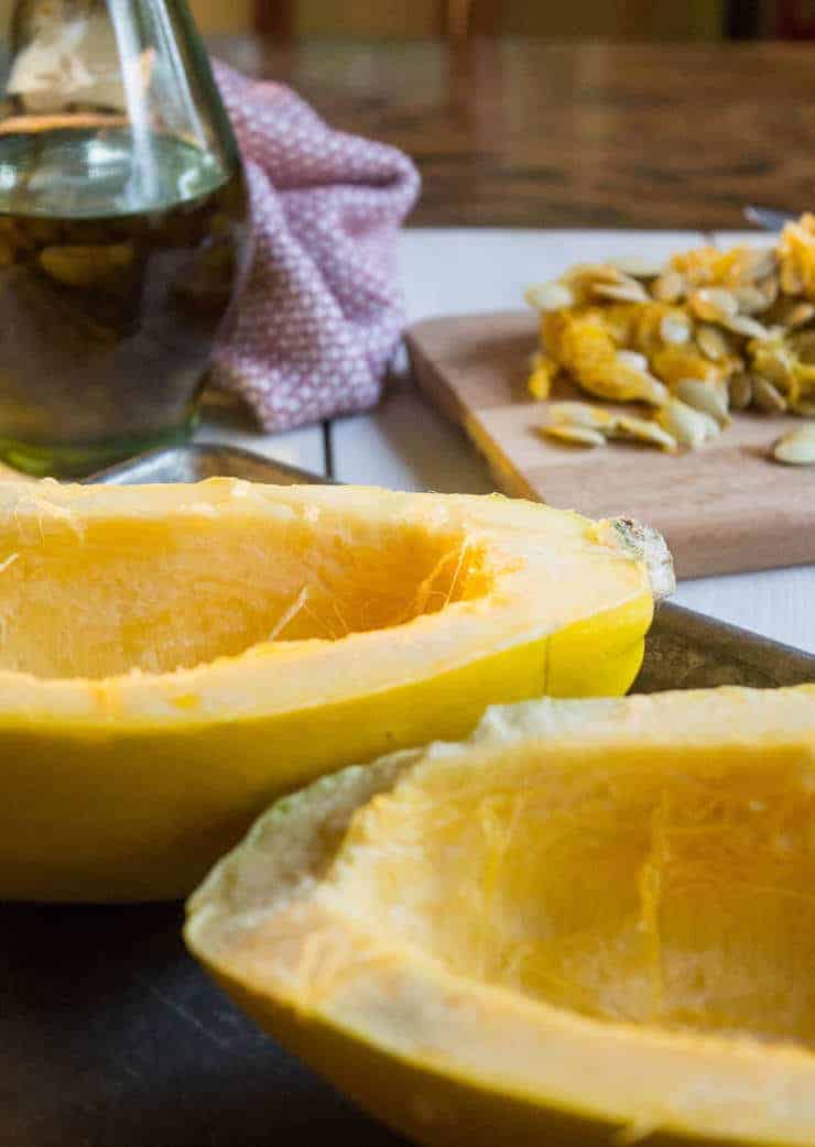 Spaghetti squash cut in half with the seeds removed.