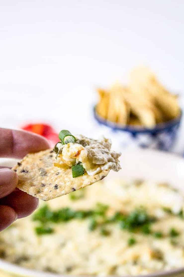 A scoopful of Jalapeno Popper Dip on a chip.