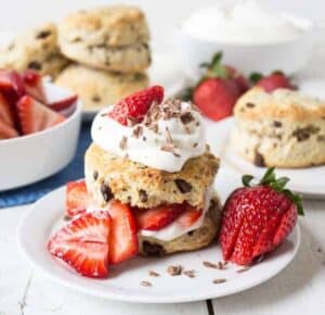 Strawberry shortcake with fresh strawberries topped with whipped cream.