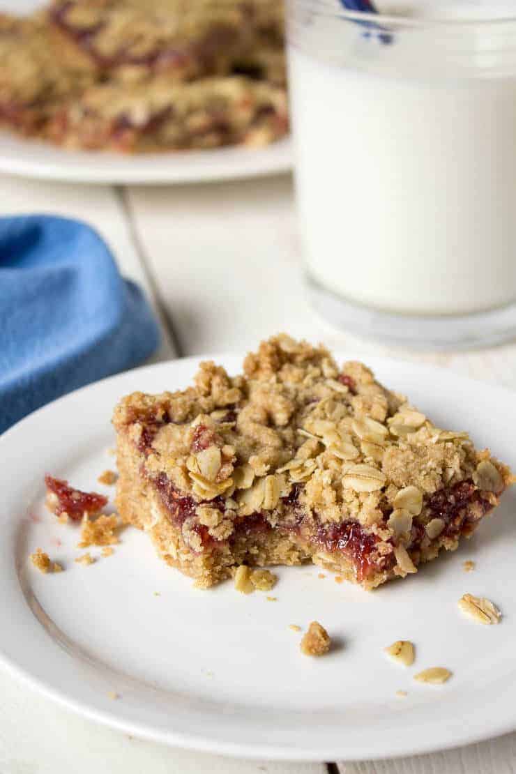 Raspberry oat bars are made easy with raspberry jam as the filling!