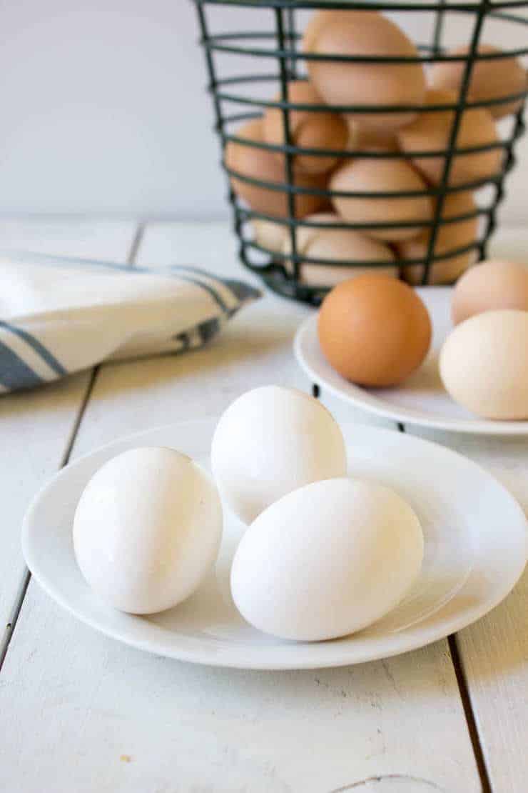 White eggs on a plate.