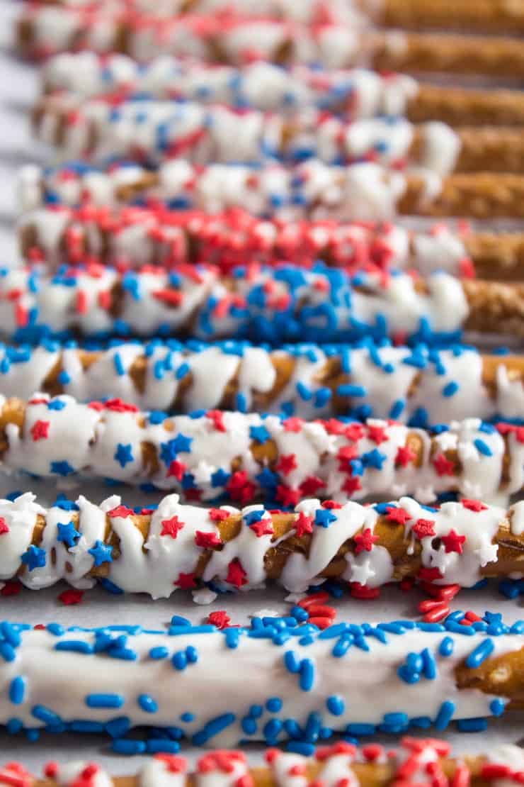 Patriot White Chocolate Pretzels covered with red and blue sprinkles.