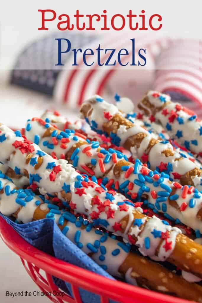 A basket filled with chocolate covered pretzels.