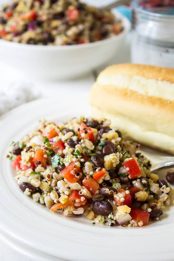 Farro mixed with quinoa, tomatoes, black beans and fresh herbs.