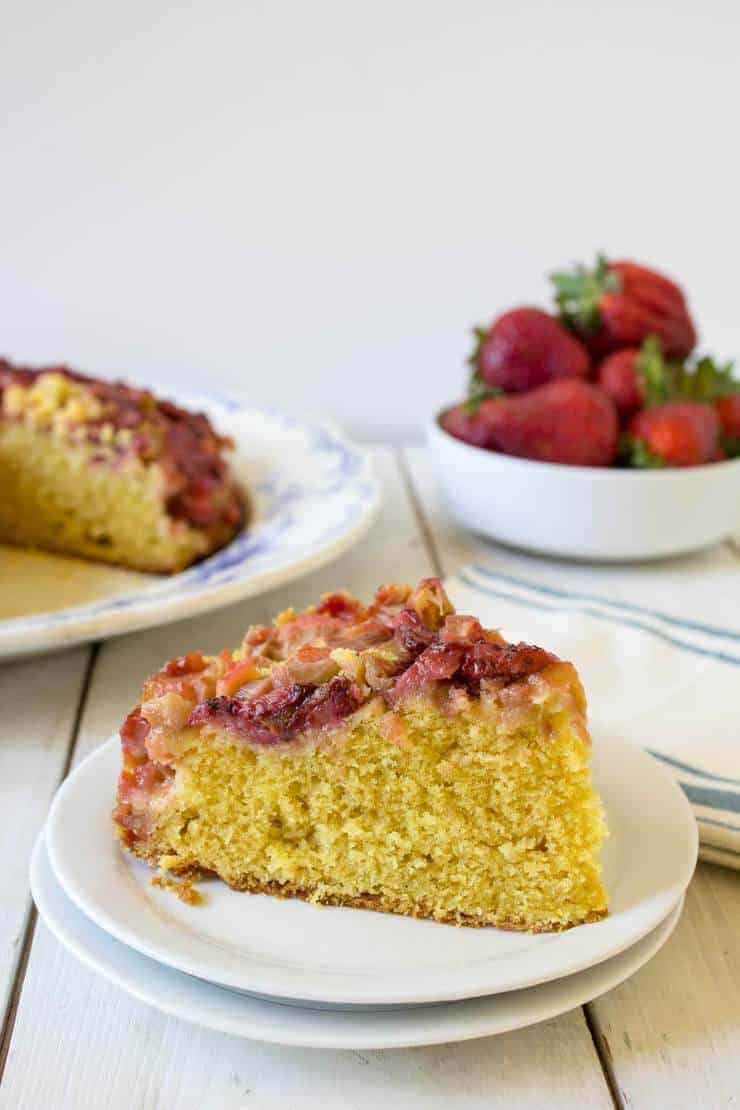 Slice of strawberry rhubarb upside down cake