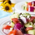 Tomatoes, Cucumbers, Red Onions and Feta are delicious in this Greek Salad.