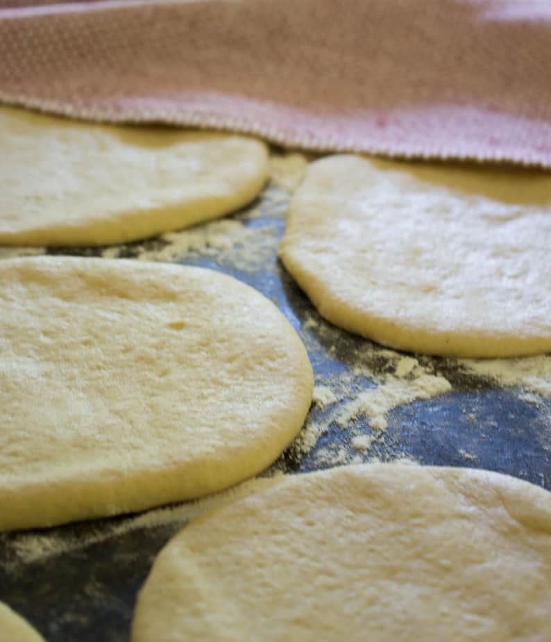 Pita bread dough rolled out and ready for the oven.