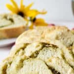 Bread with a swirl of pesto and cheese inside.