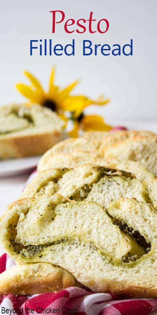 Slice of bread with pesto folded into the center of the bread.