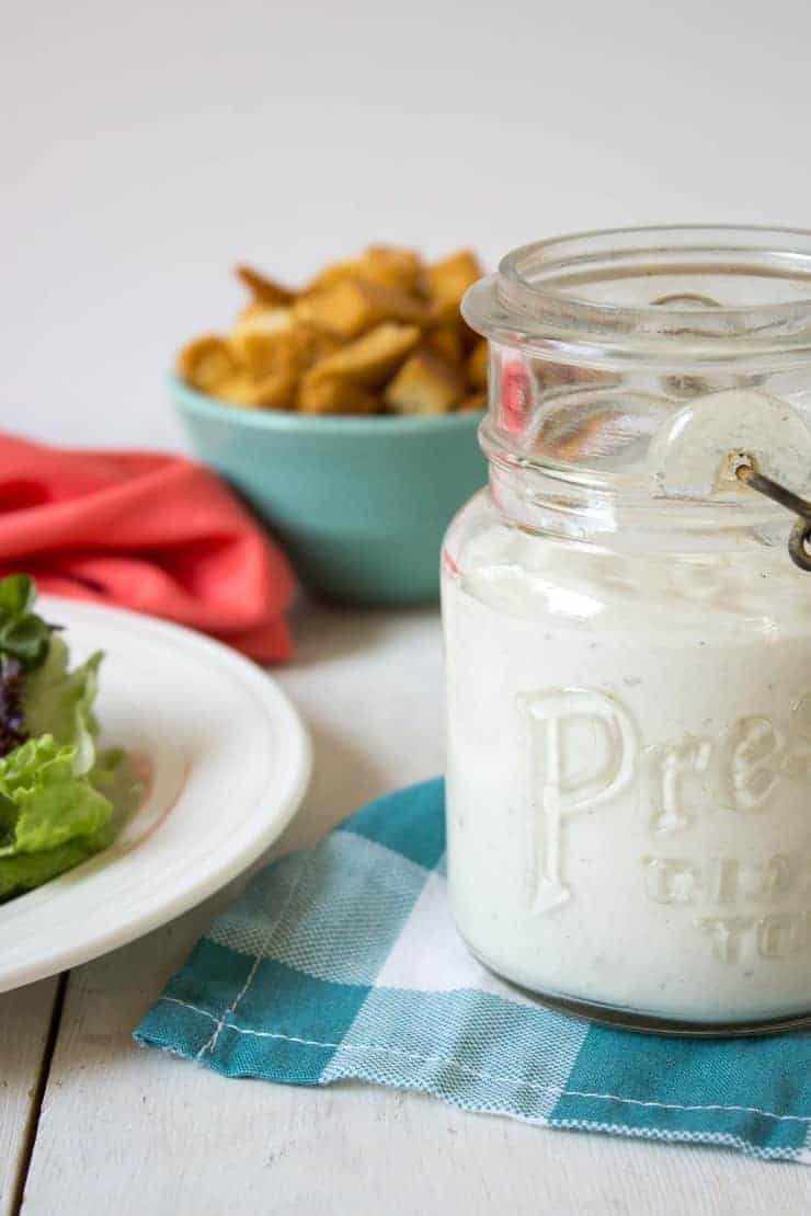 Jar of homemade blue cheese salad dressing. 