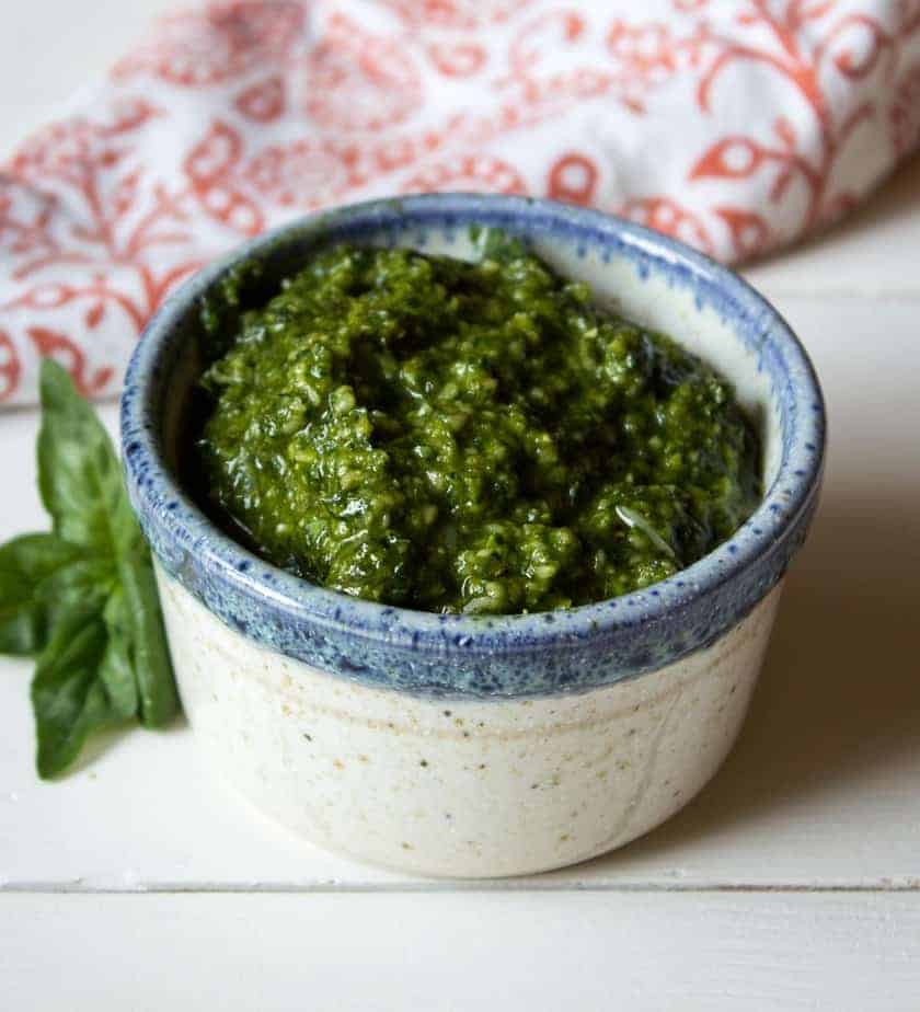 Homemade Basil Pesto in a small blue and white dish.