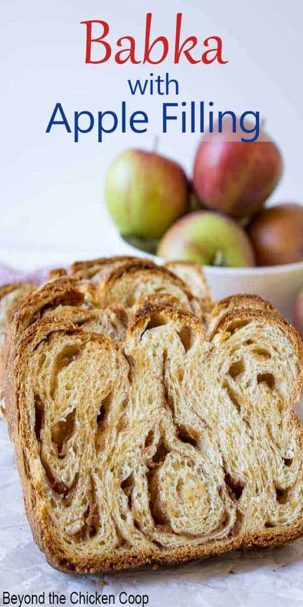 A slice of bread filled with apples and cinnamon.