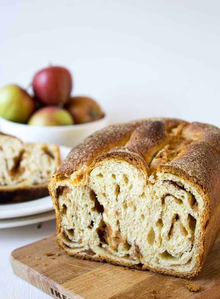 A loaf of swirled bread sliced in half.