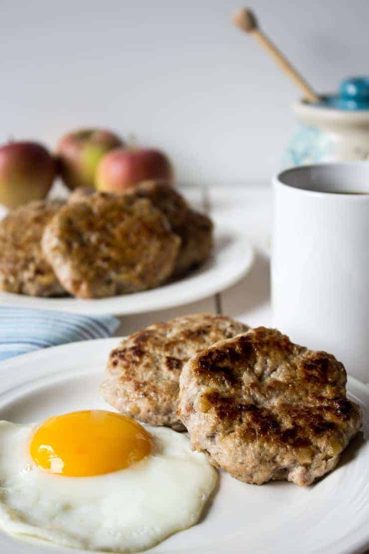 Apple Pork Breakfast sausage served with a sunny side up egg. 