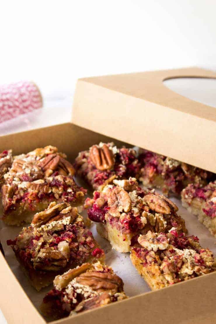 A gift box filled with Cranberry Pecan Bars