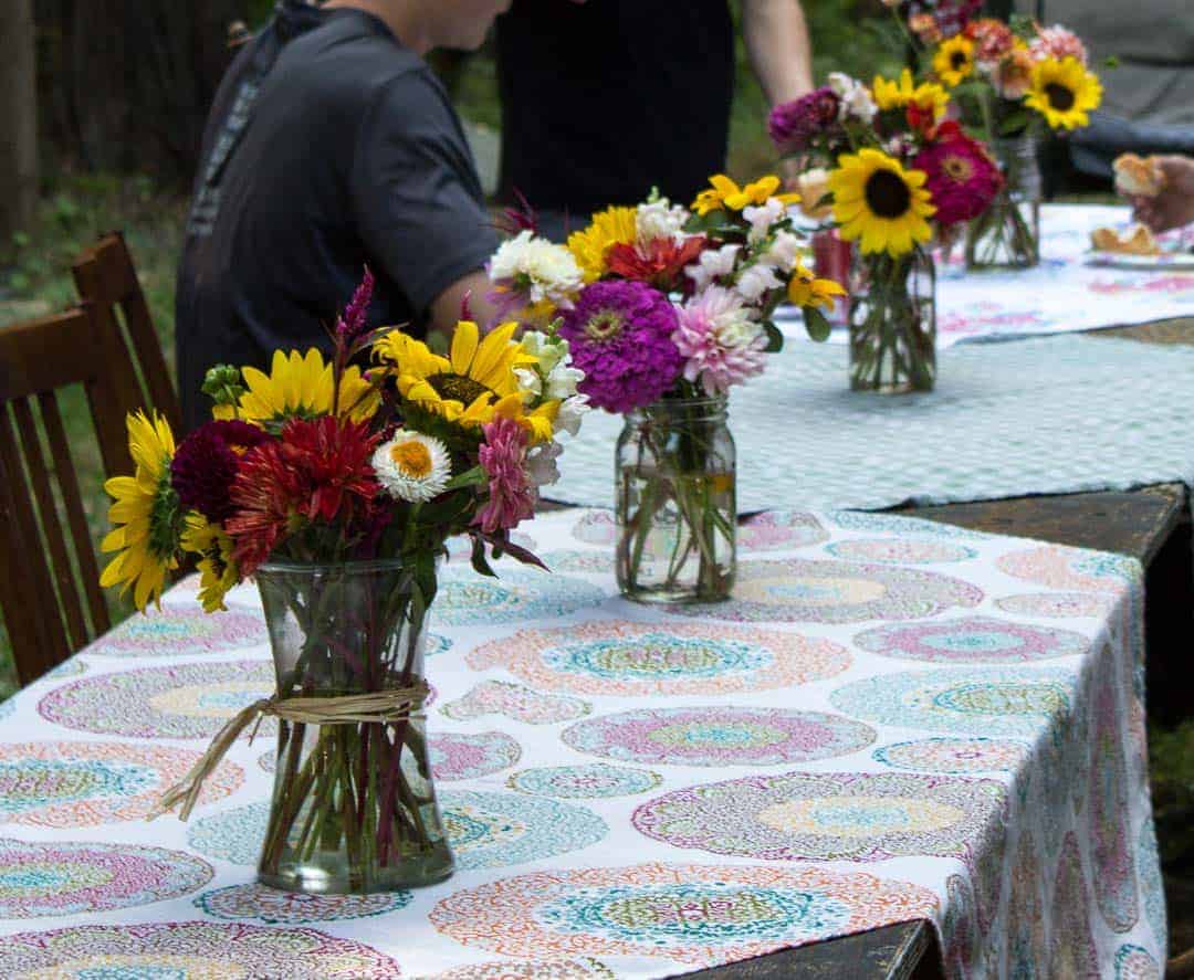 Fresh flowers on an outdoor table.