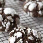 Chocolate cookies topped with powdered sugar.