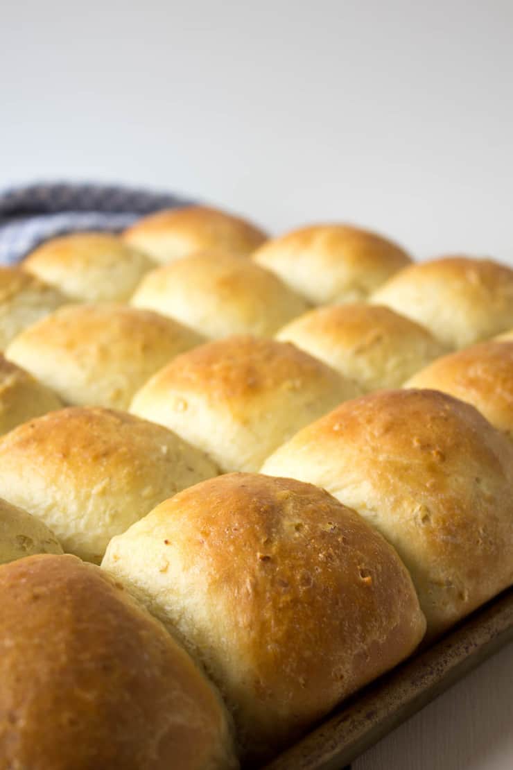 A pan full of cooked rolls. 