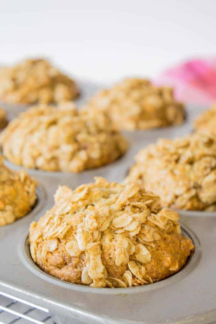 A muffin tin filled with freshly baked muffins. 