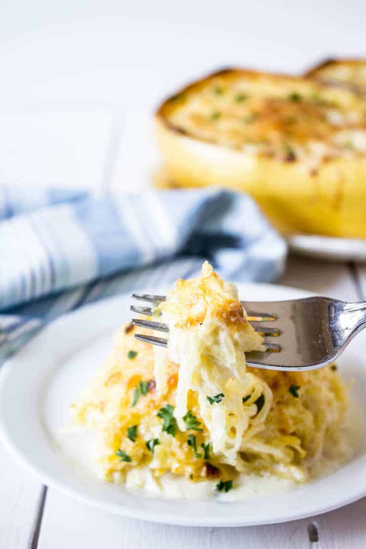 Spaghetti Squash Alfredo on a fork.