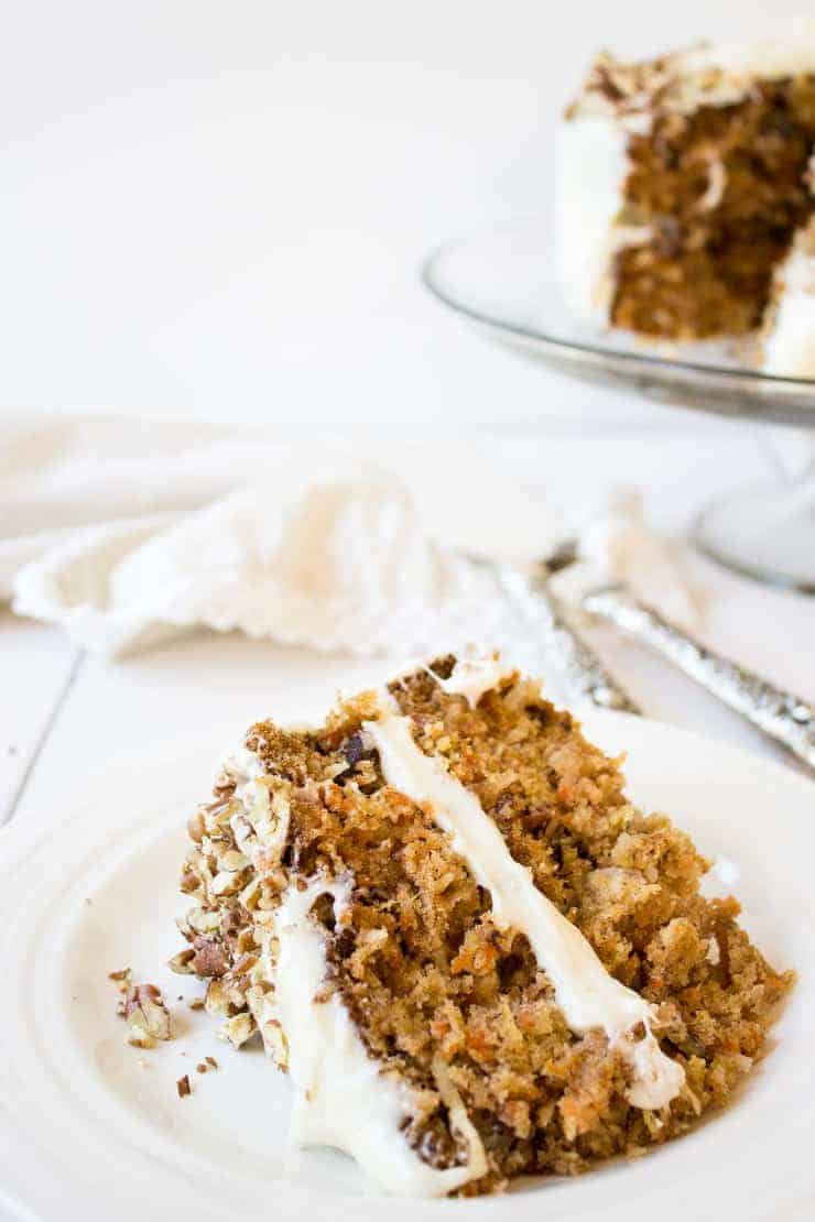 Carrot Cake served on a white plate.