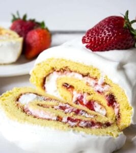 Fresh strawberries and whipped cream rolled into a light sponge cake makes an impressive dessert.
