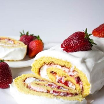 Fresh strawberries take center stage in this impressive strawberry roll cake.