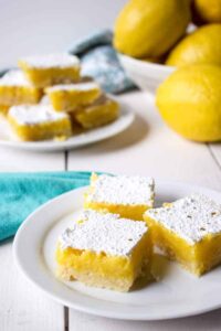 A perfect afternoon snack of a plate of lemon bars.