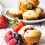 Homemade Triple Berry Muffins are filled with strawberries, raspberries and blueberries.